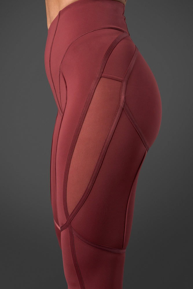 reboot tights brick red